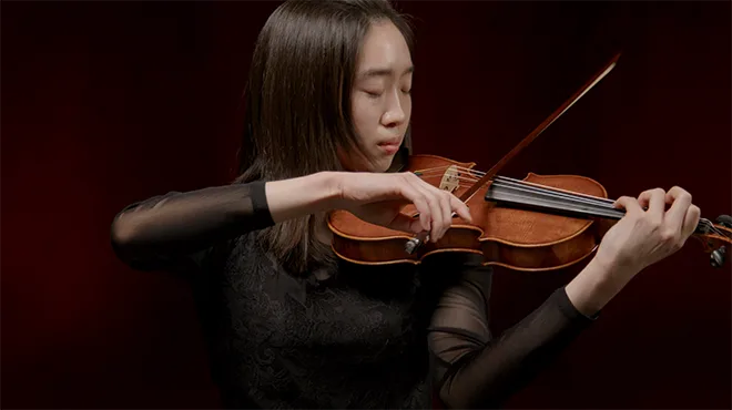 Evelyn Song plays a violin made by esteemed luthier, Howard Needham